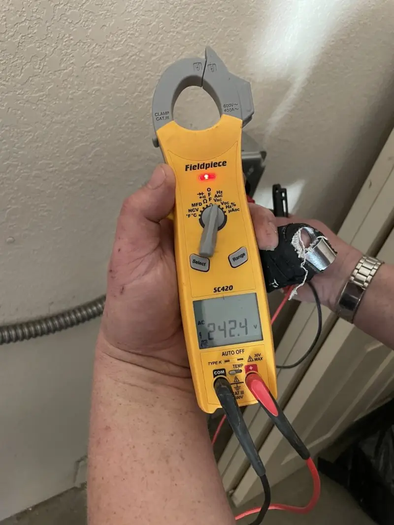 Voltage testing with clamp meter during Generator Installation in Cottonwood